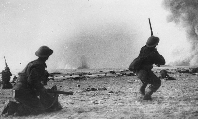 Soldiers from the BEF fire at low flying German aircraft during the Dunkirk evacuation.