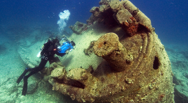Diver inspecting wreck